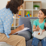 ABA therapist taking session with girl