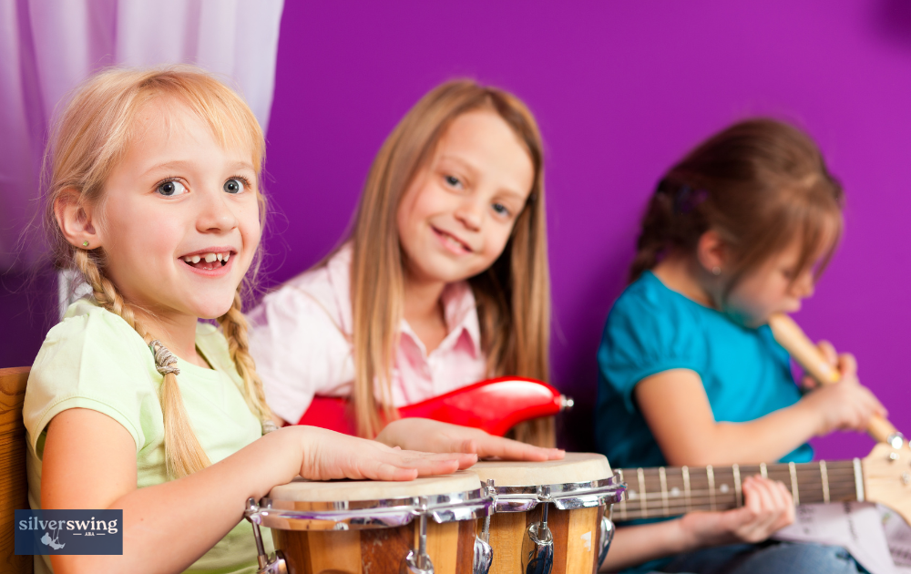 Kids receiving music therapy